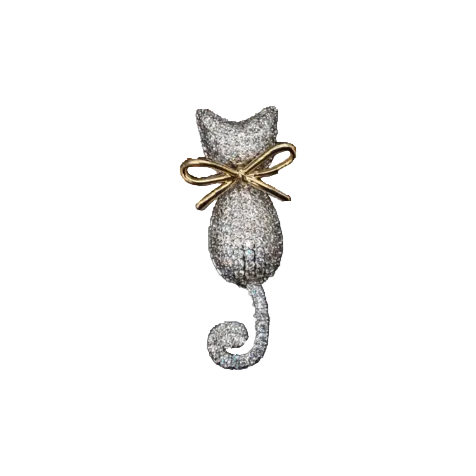Silver cat-shaped brooch with a gold bow on a white background