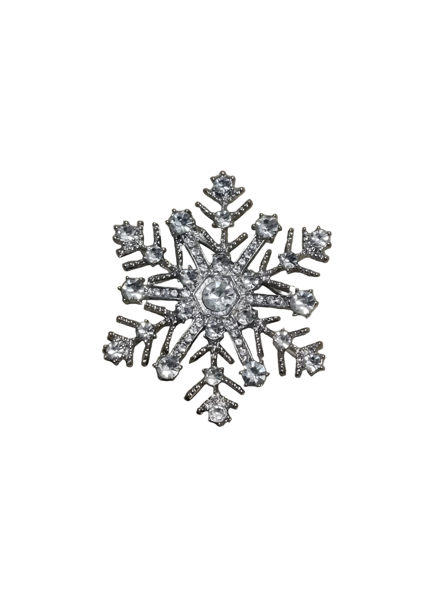 Silver snowflake-shaped brooch