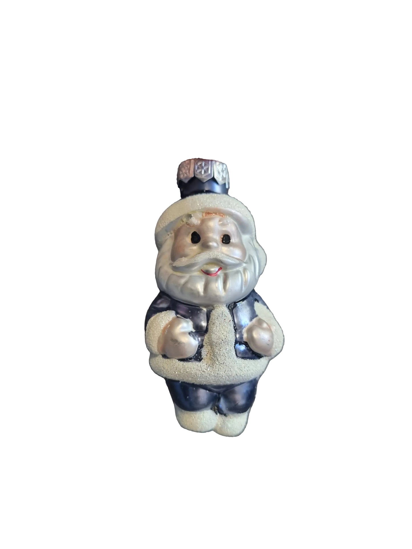 Hand holding a Santa ornament