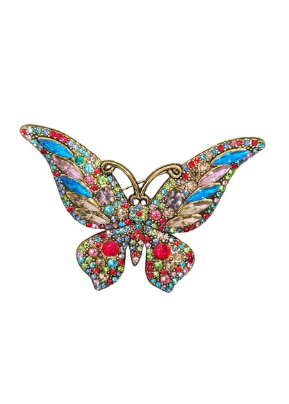 A butterfly-shaped brooch embellished with colorful rhinestones and blue enamel