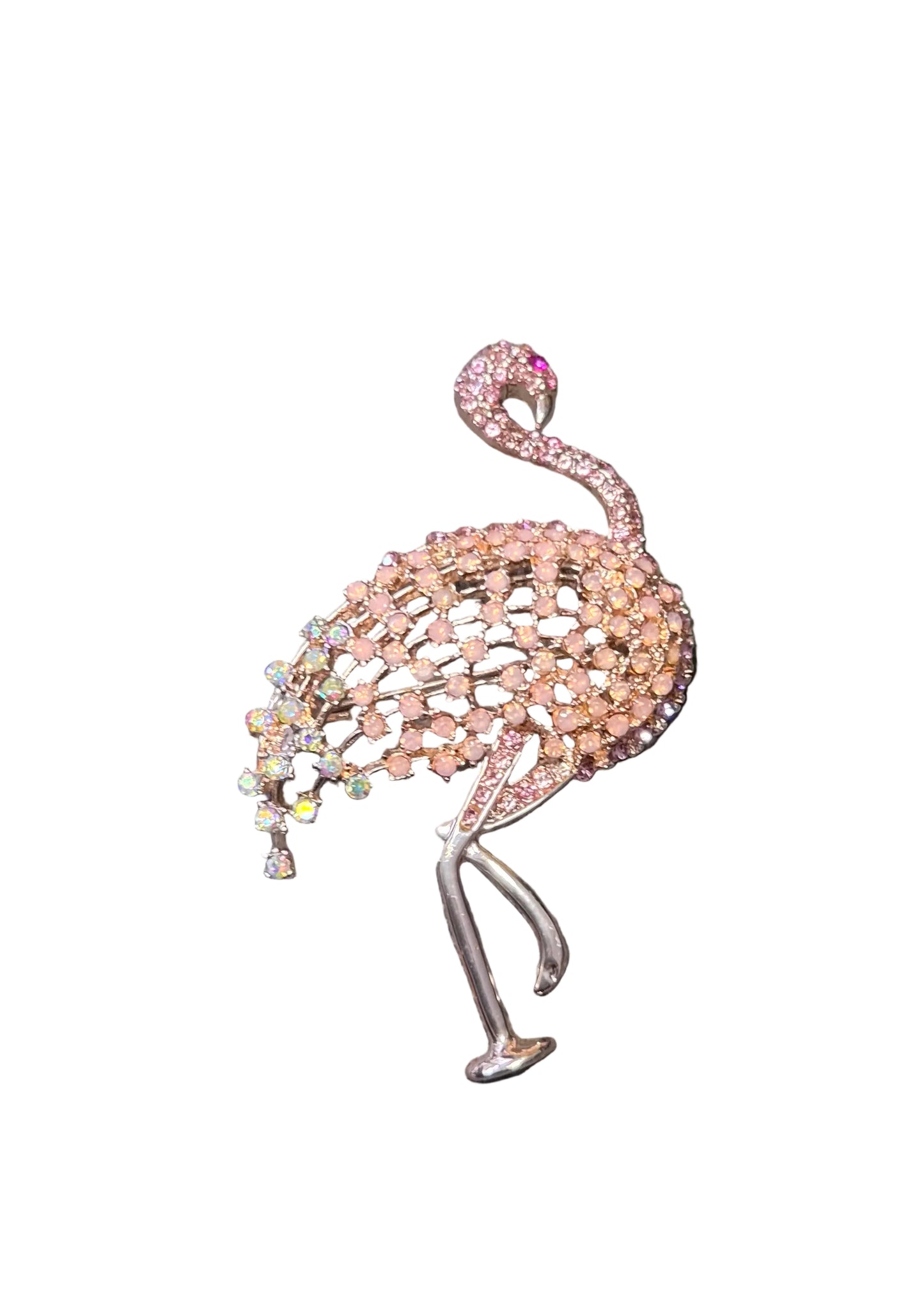 A flamingo-shaped brooch made of pink  crystals and silver-toned metal