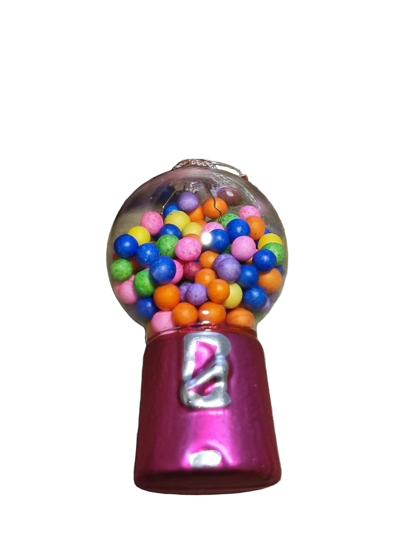 a small gumball machine ornament with colorful gumballs