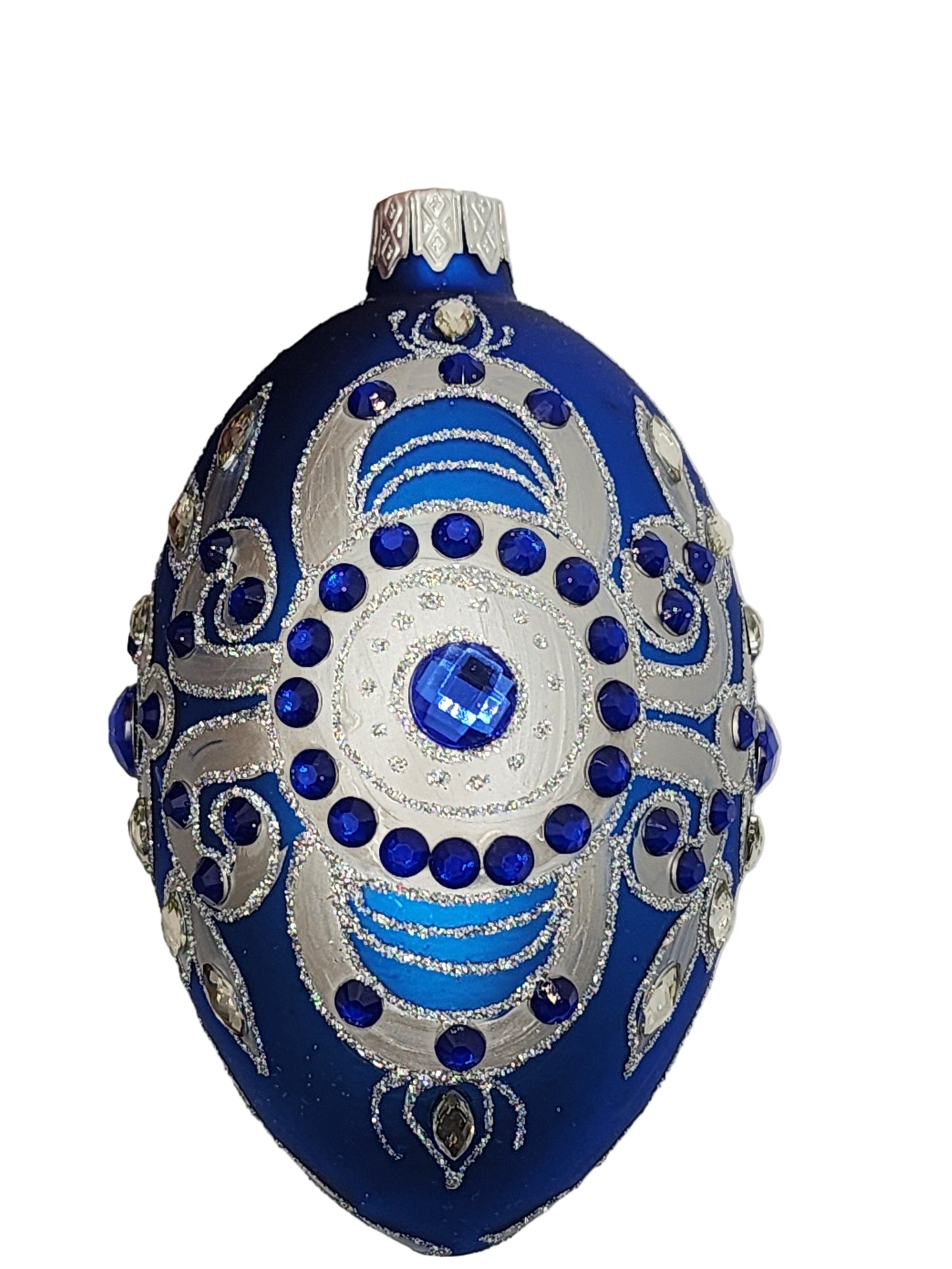 Decorative blue and silver egg on a white background