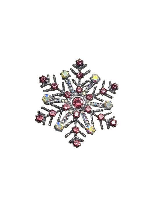 Decorative snowflake with colorful gemstones