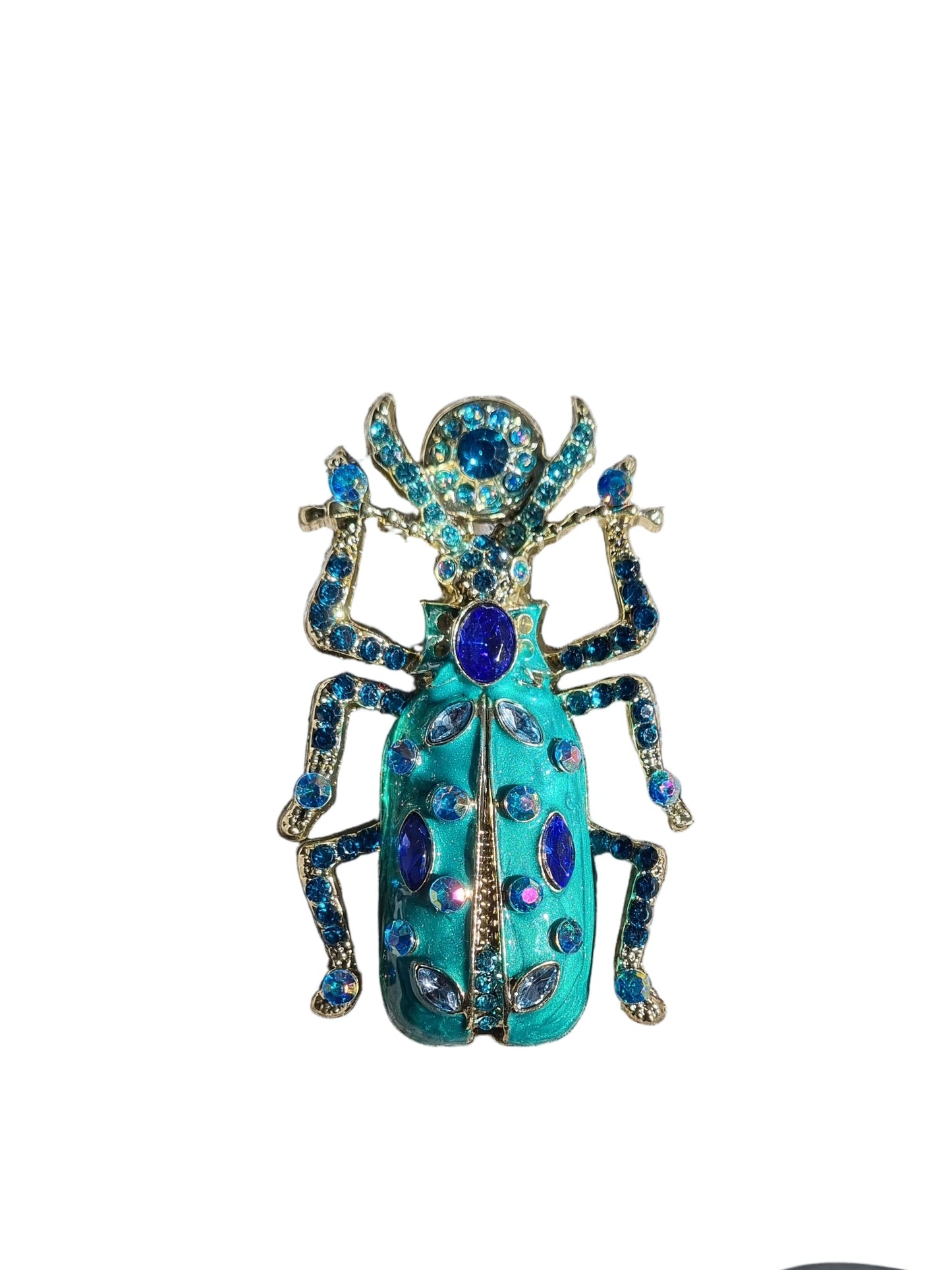 Teal decorative brooch shaped like a beetle 