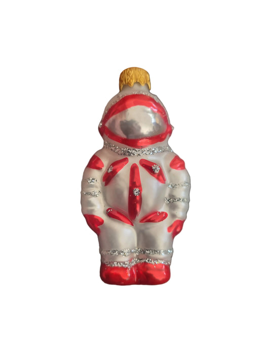Decorative astronaut with red and silver design 