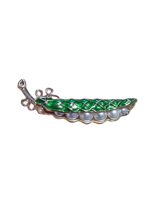 Decorative green and gold brooch with pearl-like stones 